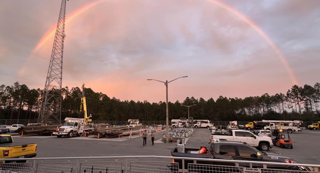 Rainbow over the Lake City District Office during storm restoration